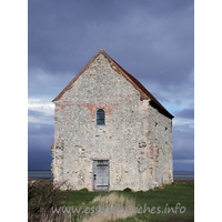 St Peter-on-the-Wall, Bradwell-juxta-Mare  Church - The W wall, showing the reused Roman bricks around the window.
