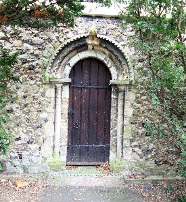 Holy Trinity, Southchurch Church - This is the original Norman north door, relocated to become the west door of the new nave, after Comper's enlargements in 1906.