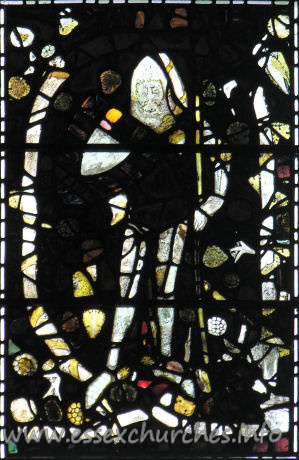St John the Baptist, Thaxted Church - This stained glass window, in the centre of the S window in the S transept, depicts Edmund Mortimer d.1381. This is believed to be the earliest piece of medieval glass in Thaxted. It used to be in the north transept, but was re-positioned after the great storm of 1763.