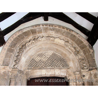 St Giles & All Saints, Orsett Church - The ornate Norman arch above the S doorway.

