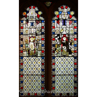 St Edmund, Abbess Roding Church - Stained glass depicting a Bishop and a female saint. This is surrounded by tabernacle-work.