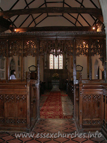 St Edmund, Abbess Roding Church - This view of the nave, looking W from the chancel shows the nave roof tie beams, which are supported on arched braces.