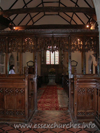 , Abbess%Roding Church - This view of the nave, looking W from the chancel shows the nave roof tie beams, which are supported on arched braces.