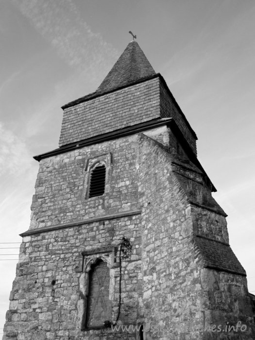 St Margaret, Bowers Gifford Church - This tower is supported by just one buttress in the SW corner, but it is huge. Notice that the two windows in this wall of the tower are not aligned with one another. The upper, shuttered window appears to be central. Interestingly, in the rebuild plans of 1829-1830, shown at 
Church Plans Online, the windows are shown to be aligned.