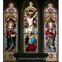 St Catherine, Wickford Church - The East window depicts Jesus on the cross, flanked by Saints. It is in memory of Henry Stone, churchwarden during the rebuilding of the church. It was recently (1998) restored.