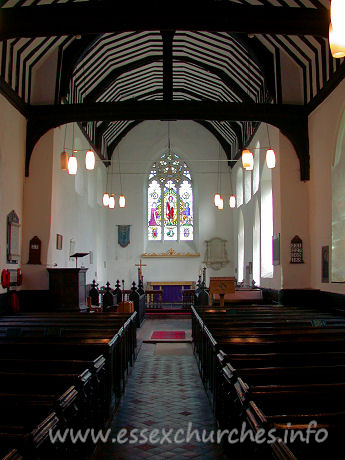 St Margaret, Stanford Rivers Church - This view of the church interior shows the nave roof with 
tie-beams on braces and king-posts.

