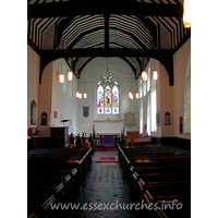 St Margaret, Stanford Rivers Church - This view of the church interior shows the nave roof with 
tie-beams on braces and king-posts.

