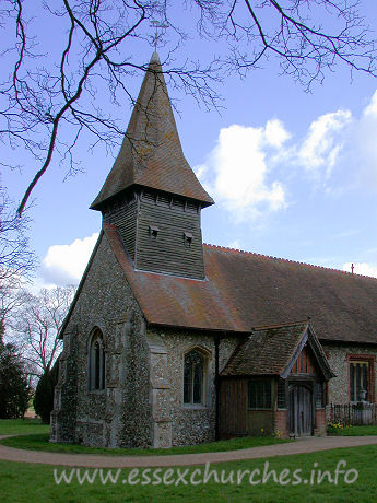 St Mary, Broxted Church - The belfry is weatherboarded, and stands on four posts.

