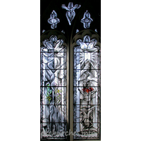 St Mary, Broxted Church - One of two two-light 'hostage' windows by John Clark. This 
window symbolises Captivity. It was put in in 1993 to commemorate the long cruel 
captivity and eventual release of journalist John McCarthy, an active churchman, 
whose home before his kidnapping was the big house next door.

