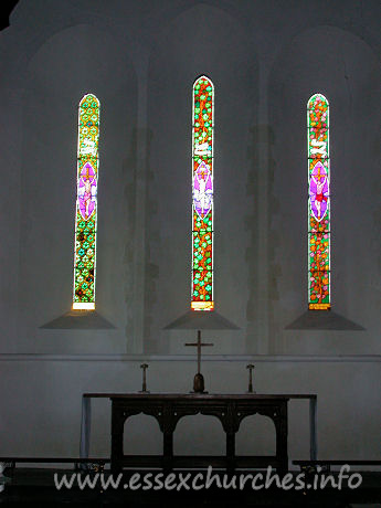 St Mary, Broxted Church - Original lancet windows and triptych reredos. 
The East window is by Francis Stephens.


