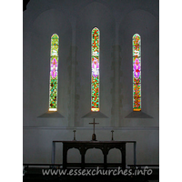 St Mary, Broxted Church - Original lancet windows and triptych reredos. 
The East window is by Francis Stephens.

