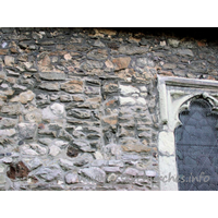 St Mary & All Saints, Great Stambridge Church - Clearly visible here, is one of the very narrow, blocked 
windows.
