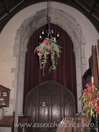 St Peter, Paglesham Church - 


At one time, there was, beneath this tower arch, a gallery for 
singers. The tower arch is supported by half-octagonal responds with moulded 
capitals and bases.


