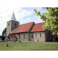 St Nicholas, Great Wakering Church - The nave of the church is Early Norman. This is demonstrated by the blocked N 
window. Just visible is one of the Early Norman flat broad pilaster buttresses 
at the base of the tower, although the upper parts of the tower are later 
Norman, a fact borne out by the blocked Norman W window visible from inside the 
nave. The upper broach spire is C15 or later.
