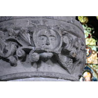 St John the Baptist, Mucking Church - Circular pier in the S aisle arcade, with stiff-leaf capital. Two faces appear - one facing north, the other south-west. This one - north facing, is a green man.