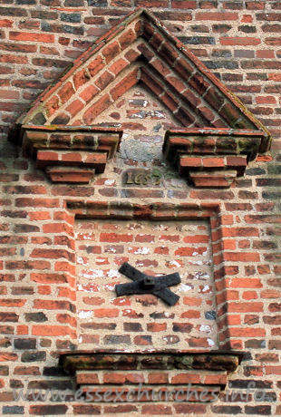 St Giles, Mountnessing Church - The pedimented window dates the W wall to 1653.



