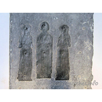 All Saints, Rettendon Church - Brass of c1535, with a civilian and two wives. Sadly, the 
children mentioned in "Essex Churches and Chapels" no longer seem to be present, 
something that has perhaps necessitated the unsightly fixings now used to retain 
these brasses.

	
		Image reproduced by kind
	
	
		permission of Julie Archer. 
	

