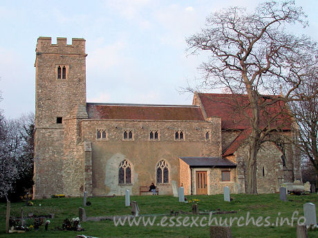 St Nicholas, Rawreth Church - This view from the south shows the mismatch of the different 
parts of the church. One would perhaps expect that it was the chancel that was 
built at a different time to the nave, but in fact, both were built in 1882. The 
only exceptions to this date are the tower, the S aisle and (not shown) the W 
wall of the N aisle.
My lovely Julie poses for us once again in front of the nave.
