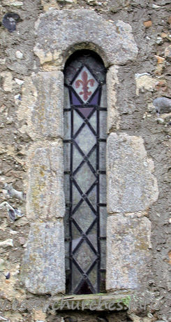 Dedication Unknown, Mashbury Church - One of two Norman windows in the north wall.
