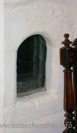 St Mary Magdalene, East Ham Church - This [now] glazed opening is the anchorite's cell. This is 
situated in the north nave wall.
