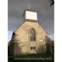 St James, Little Clacton Church - This view of the west end of the church could be a view of a remote parish church. That it isn't! The belfry sits on four posts with tie-beams and curved braces.