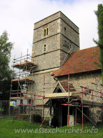 St Mary the Virgin, Strethall Church - Strethall church is one of those churches which you arrive at, and instantly feel as though you are intruding on a farmer's property. You park near some barns, and walk alongside a few tractors and the like, glimpsing the church through the trees. It is not obvious, from the North, quite how one enters the churchyard.
 The lowest stage of this tower is Norman, whilst the upper is C14.