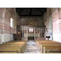 St Michael & All Angels, Copford Church - Looking towards the chancel, from the W end of the nave. Clearly visible here are four springers, which once supported the Norman barrel vaulting. Two can be seen either side of the screen, whilst the other two are clearly visible at both upper corners of the image.