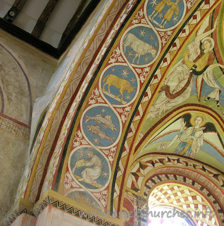 St Michael & All Angels, Copford Church - The left-most part of the underneath of the chancel arch, which depicts all 12 signs of the zodiac.From bottom to top can be seen: Aquarius, Pisces, Aries and Taurus.