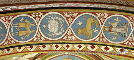 St Michael & All Angels, Copford Church - The centre part of the underneath of the chancel arch, which depicts all 12 signs of the zodiac.From left to right can be seen: Gemini, Cancer, Leo and Virgo.